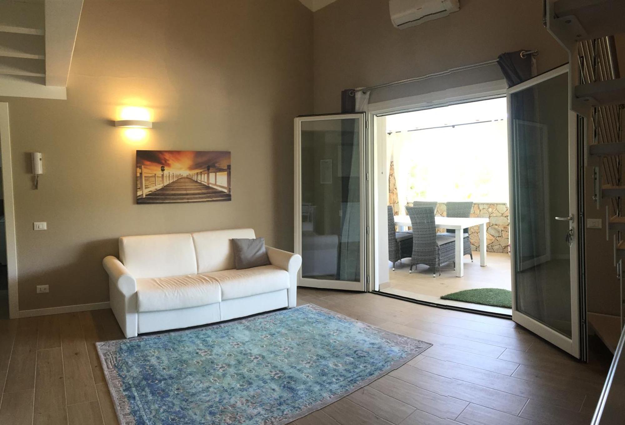 Residence Elegance Ville Ed Appartamenti A Porto Pino Exterior photo